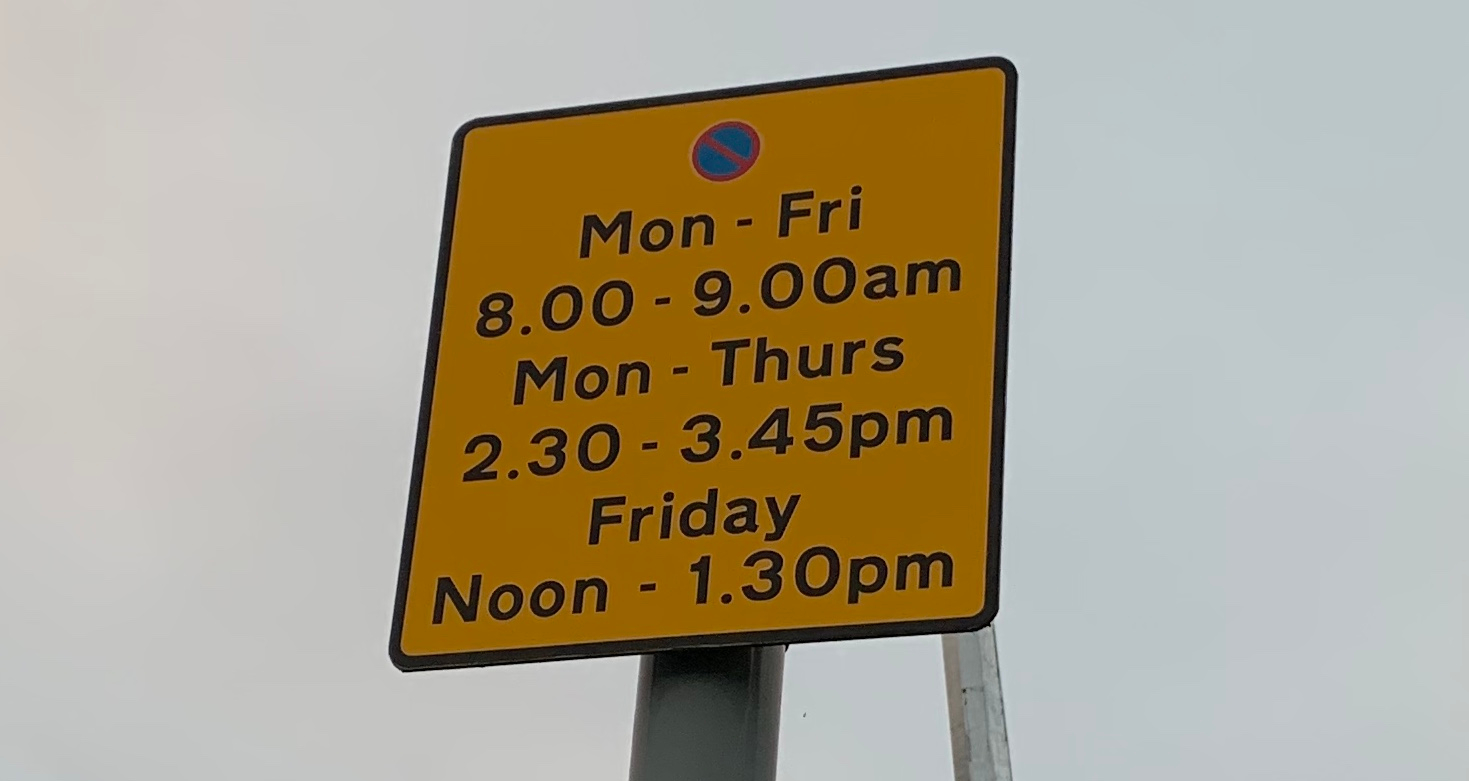 parking sign at Broadway shops side